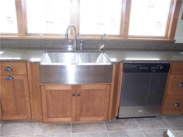 Quartz countertop with a farmhouse apron sink
